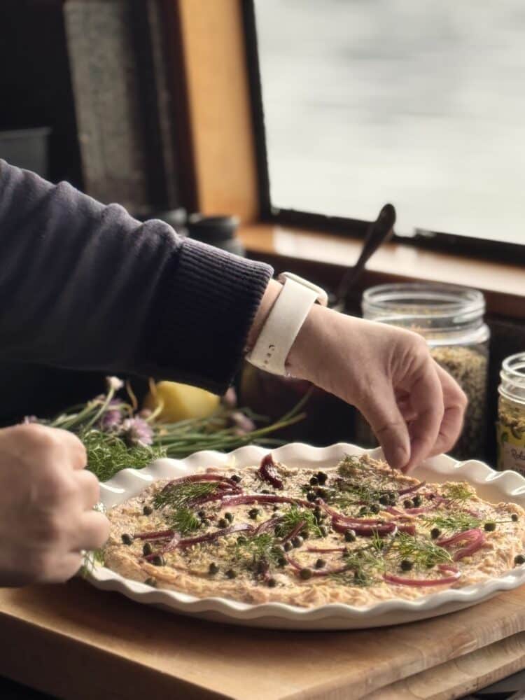 Chef Alisa's signature smoked salmon dip showcases Alaska's world-class seafood with fresh dill and bright lemon flavors.