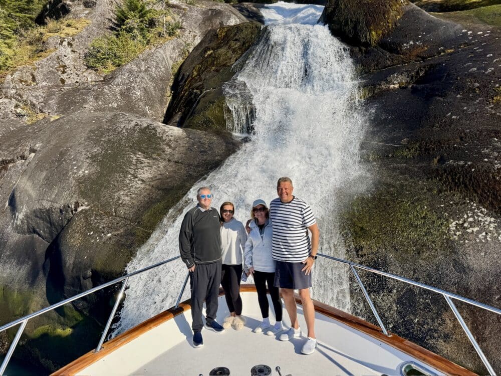 Guests enjoying the ultimate Alaska yacht charter experience aboard M/Y Dauntless — wildlife, wilderness, and world-class cuisine in Southeast Alaska.